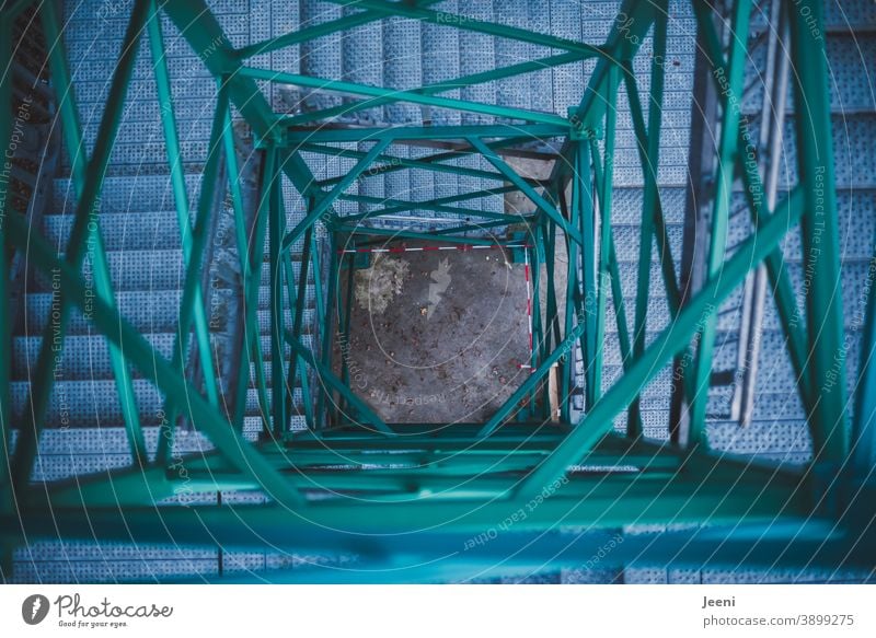 Deep abyss of an observation tower | perspective of the stairs from above | red-white barrier tape on the ground Stairs Lookout tower Winding staircase Tower