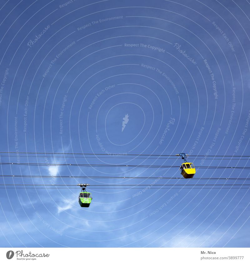 Cologne at the top gondola Cable car Sky Blue sky Gondola Aviation Wire cable Downward Wasted journey Upward Hover Yellow Passenger traffic Means of transport