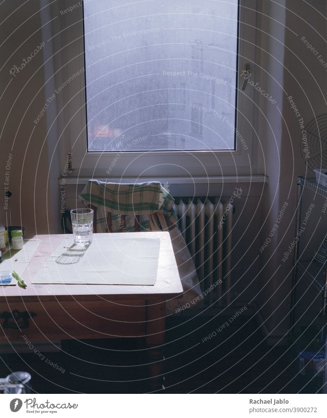 glass on kitchen table in front of dirty window Interior shot Colour photo Flat (apartment) Window Light Living or residing Shadow Kitchen Table Glass quiet