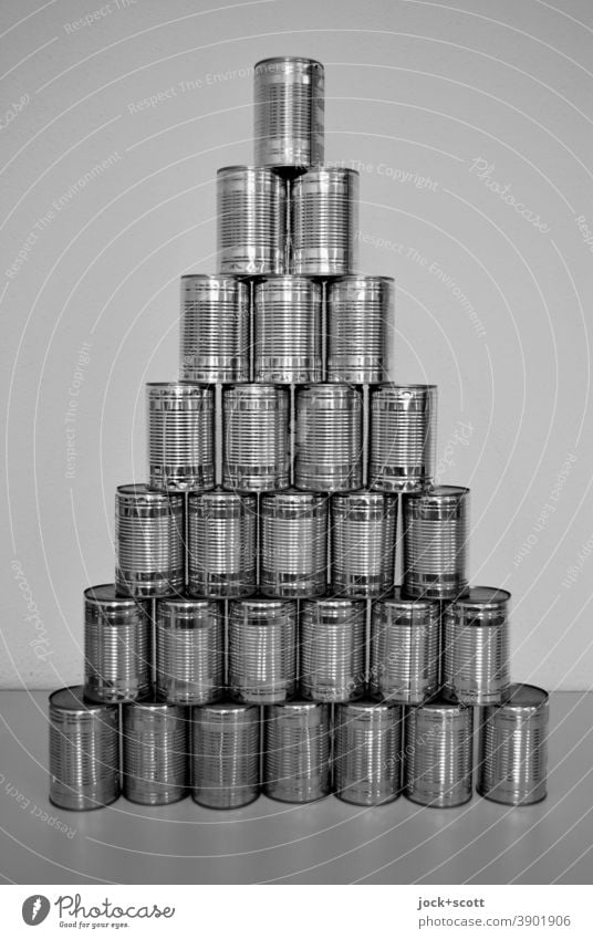 Pyramid of cans, preparation for dropping Pyramid of tins Preparation Tin Target List Artificial light Neutral Background Structures and shapes Row Stack