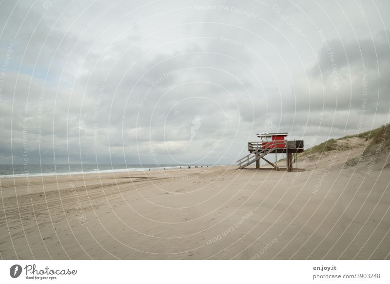 Red lifeboat on the beach of Sylt Beach Ocean lifeguard cottage Hut rescue tower dunes Sky Clouds Covered Vacation & Travel North Sea Relaxation North Sea coast