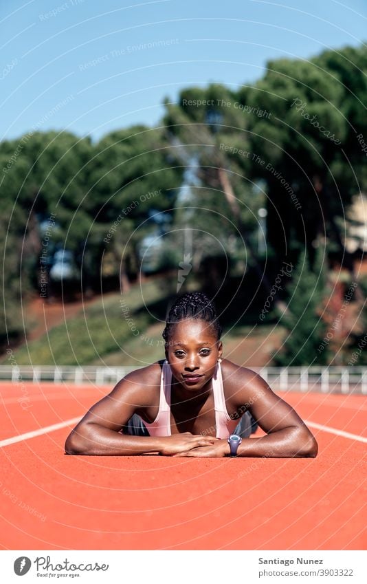 Athlete sprinter looking at camera control race run competition athlete athletics competitive ready line beginnings compete competitor olympic olympics sports