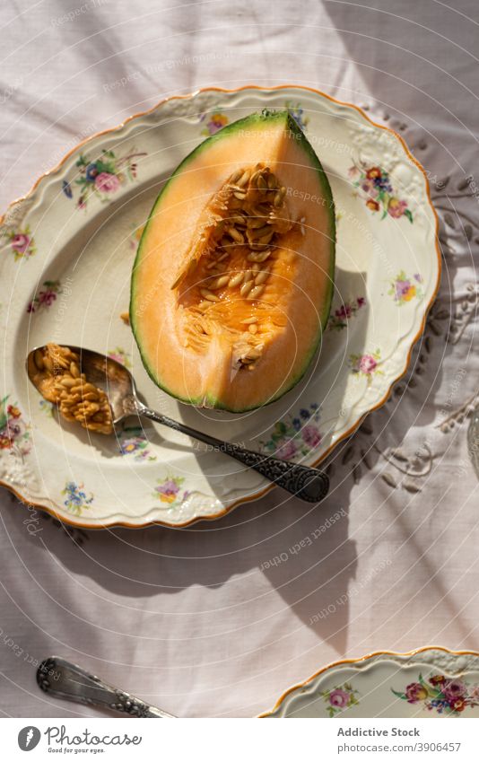 Delicious melon on plate on table slice fruit sweet piece serve delicious rustic countryside sunlight summer vitamin healthy season appetizing ripe tasty