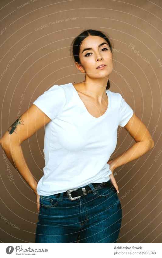 Tender woman in casual clothes in studio tender outfit delicate appearance charming peaceful relax female gentle tranquil slim serene feminine young style calm