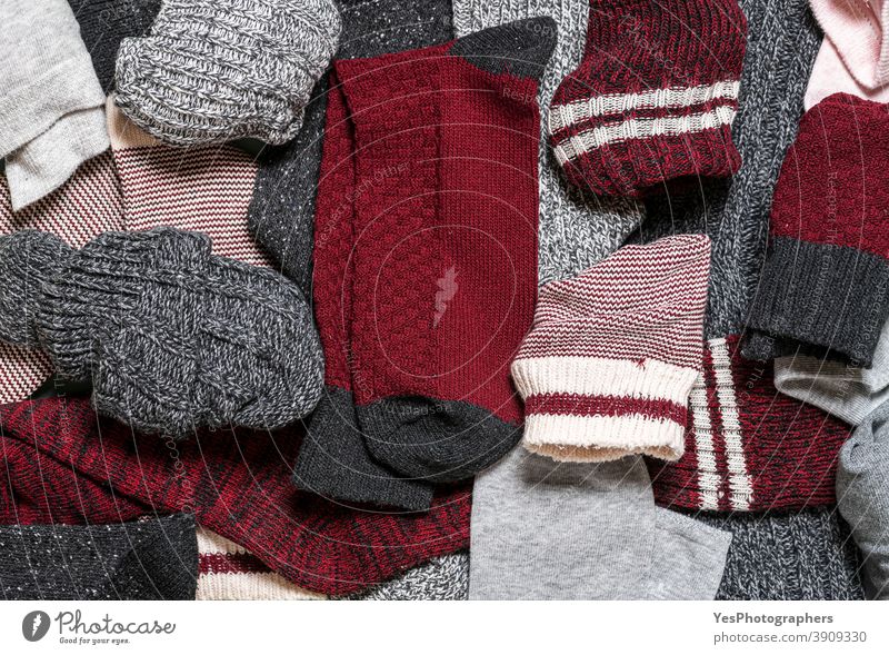 Pile of socks above view close-up. Diverse type of socks. abundance accessories assortment autumn background bundle clothing cloths colorful comfortable cotton