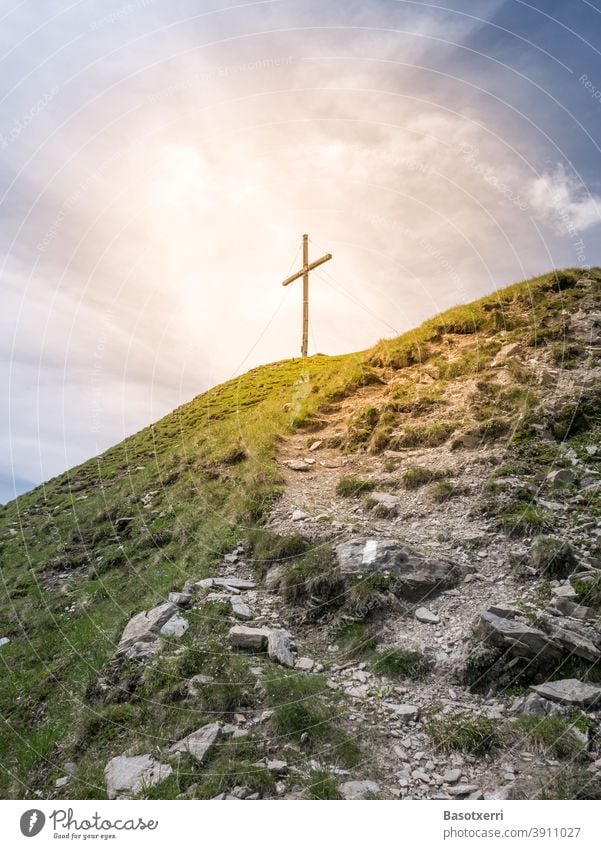 Mountain path to the lightened summit cross in the Alps Crucifix Peak Peak cross mountain God Sign Prayer Christians Christianity Catholic symbol Tyrol