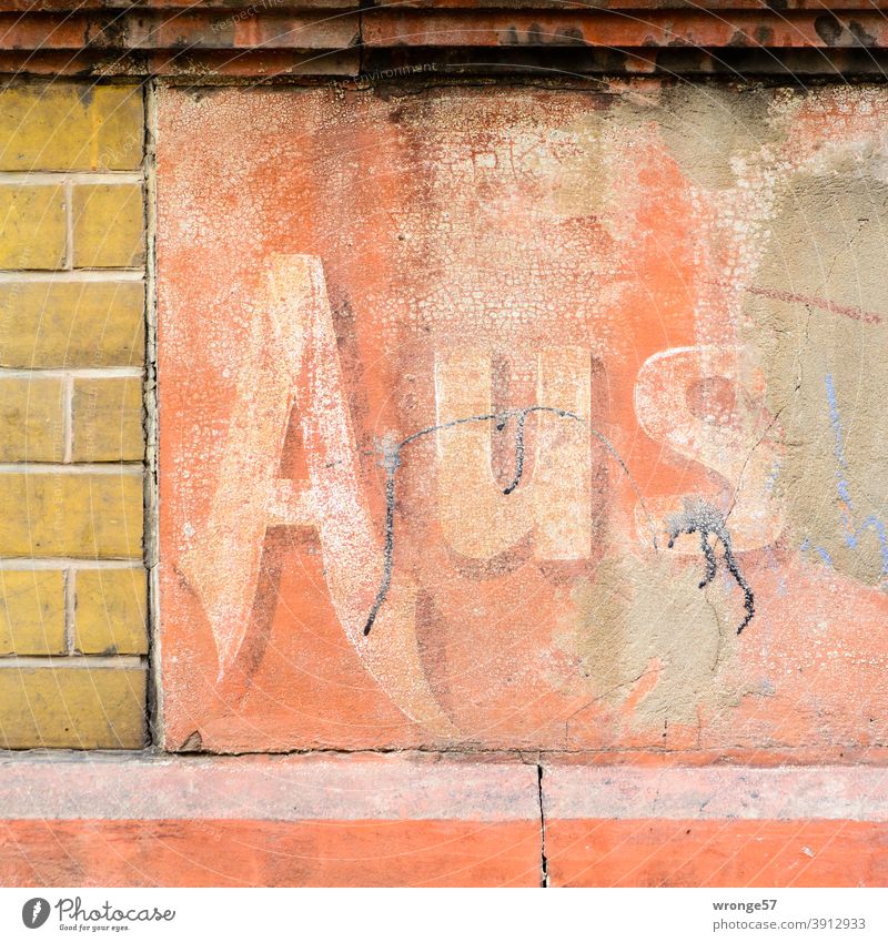 Off | Remaining part of an advertisement on a building facade from portion Part of speech syllable Word syllable Advertising Facades facade advertising Building