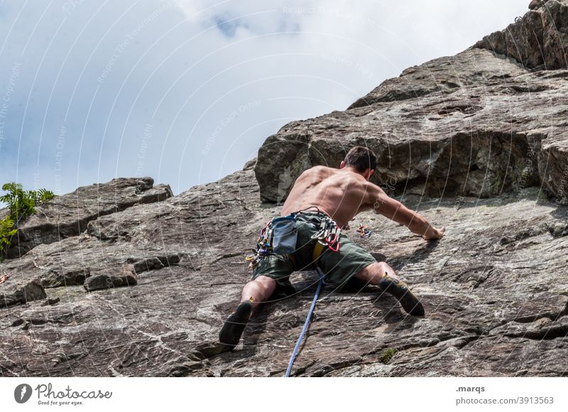 climb Rock Climbing Extreme sports Man Leisure and hobbies Mountaineering Effort Muscular Steep Brave Wall of rock free torso peril Trust Safety Free climber