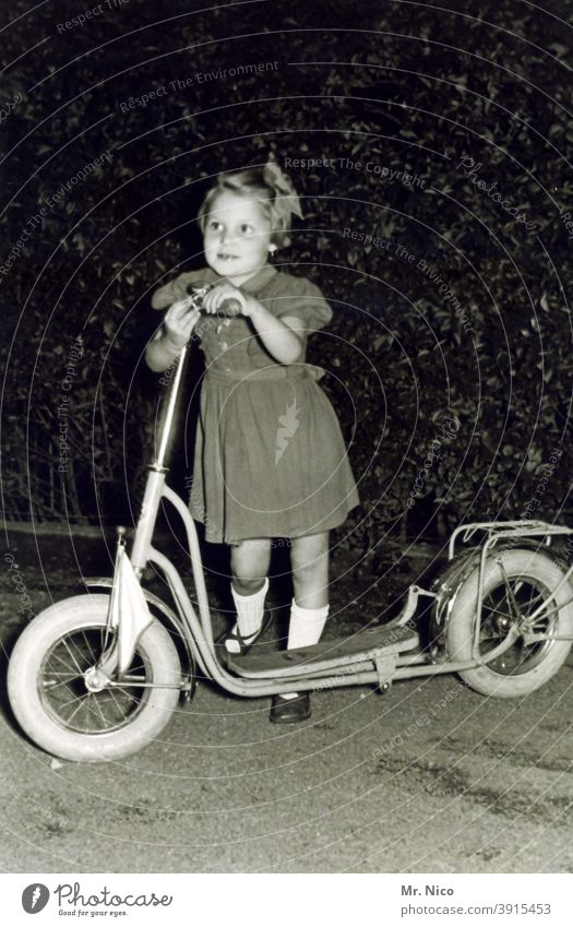big scooter , little girl Infancy Childhood memory Leisure and hobbies Old Joie de vivre (Vitality) Black & white photo Fashion Retro Dress Toys Toddler Scooter