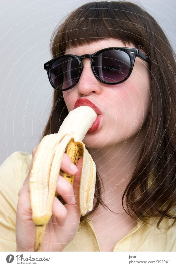 banana II Fruit Vegetarian diet Feminine Young woman Youth (Young adults) Sunglasses Bangs Eating To enjoy Desire Healthy Lust Banana Vitamin Healthy Eating