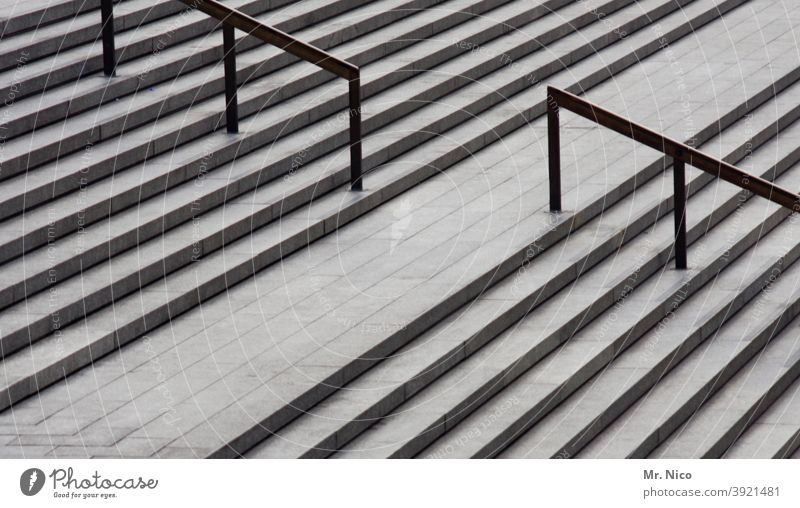 Open staircase Architecture concrete staircase Downward Upward Above Manmade structures Stairs lines Structures and shapes Gray Steps upstairs Stone steps