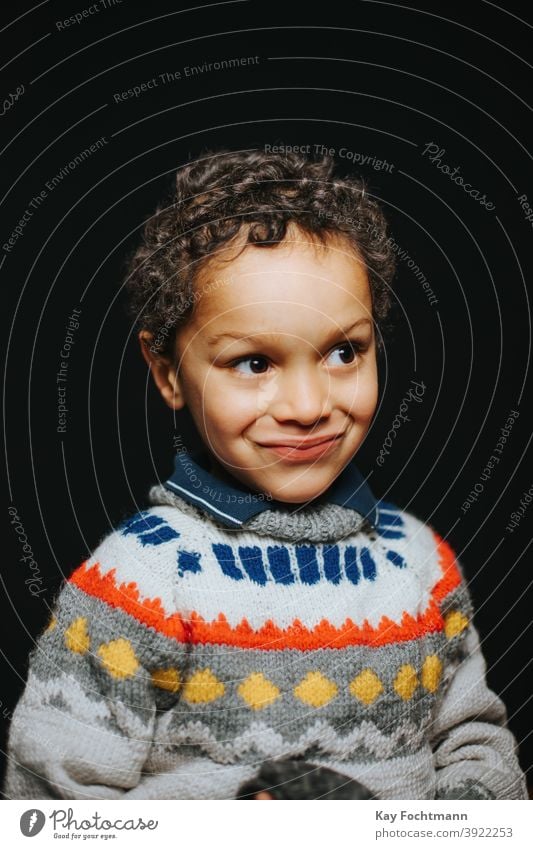 studio portrait of cute black boy smiling african american boys carefree casual clothing child childhood children cold emotion expression freedom happiness
