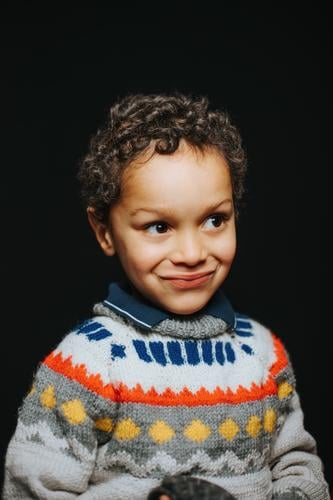 studio portrait of cute black boy smiling african american boys carefree casual clothing child childhood children cold emotion expression freedom happiness