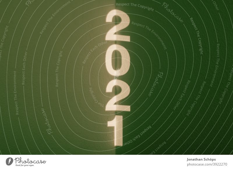Year 2021 as font projection typographical Data projector Start of the year Year date New Year Projection writing New Year's Eve 2021 typography Wall (building)