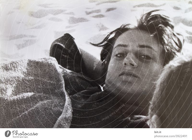 bitti lies l on the beach of portugal Woman Young woman Beach Lie Human being Feminine 18 - 30 years Looking into the camera Face portrait Black & white photo