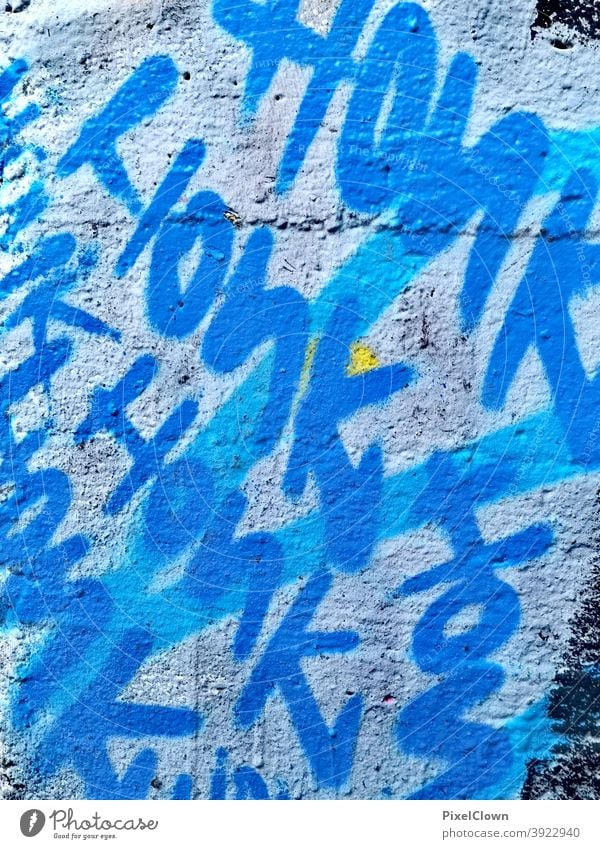 blue graffiti Graffiti Wall (building) Facade Daub Street art Wall (barrier) Characters Youth culture Subculture Word Text Typography Trashy