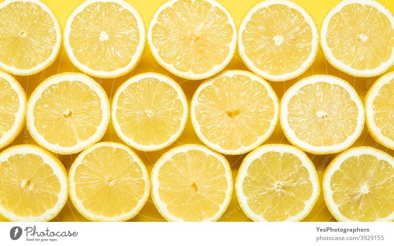 Sliced lemons background. Top view with sliced lemons 2021 above view abstract abundance aligned bright citrus color detox diet eating farmers market flat lay