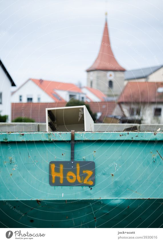 !Trash! 2020 | Wood in container Container Building yard Church spire Lettering Signs and labeling blurriness Small Town Franconia Handwriting waste Sky Drawer
