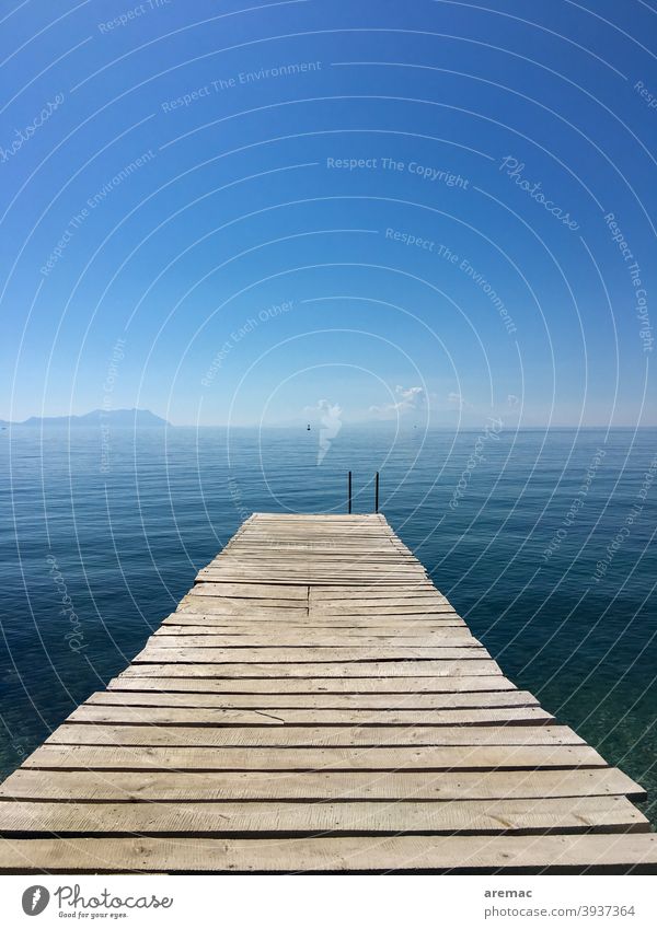 jetty with blue sea and sky Deserted Exterior shot Nature Colour photo Day Footbridge Calm Turkey boards Sky Mediterranean sea