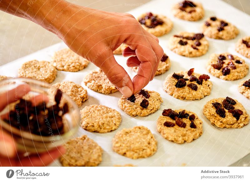 Pastry chef making cookies with dried berries pastry shortcrust berry confectionery sweet prepare kitchen culinary put add ingredient meal process dough food
