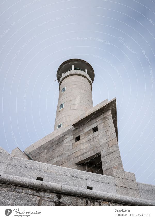 Lighthouse at Cape Punta Nariga at the Costa da Morte in Galicia, Spain. Concrete Gray Upward Northern Spain Atlantic Ocean voyage Travel photography Tourism