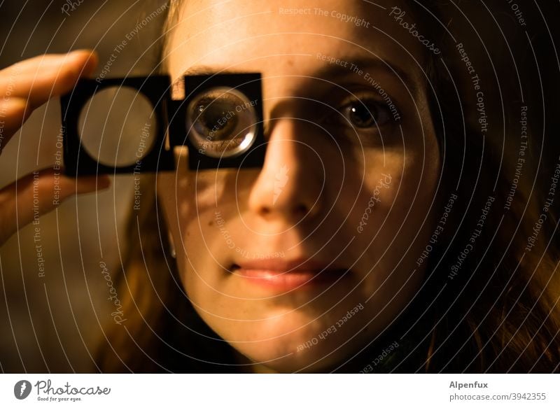 Universal Soldier Woman Magnifying glass Magnifying effect Close-up Colour photo Face of a woman portrait Eyes Young woman Youth (Young adults) 18 - 30 years