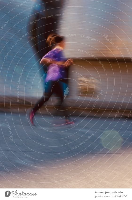 woman running on the street marathon runner jogging action fitness health Lifestyle Jogger Sports Sports Training Woman one person City Street streetphotography