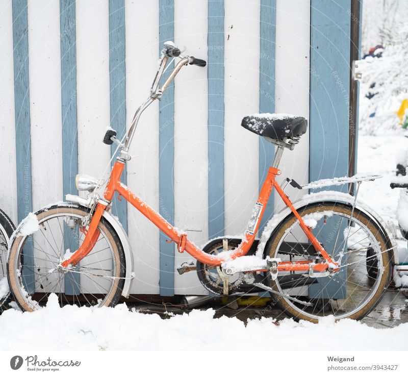 Folding bike in winter Bicycle Cycling Orange Winter Snow Cold Stripe Retro Retro Colours stylish Folding bicycle