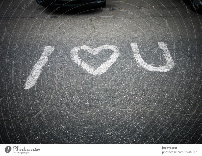 Expression of love Short and sweet i love you English Asphalt Parking lot Street art Infatuation Characters Declaration of love With love Gray Heart (symbol)