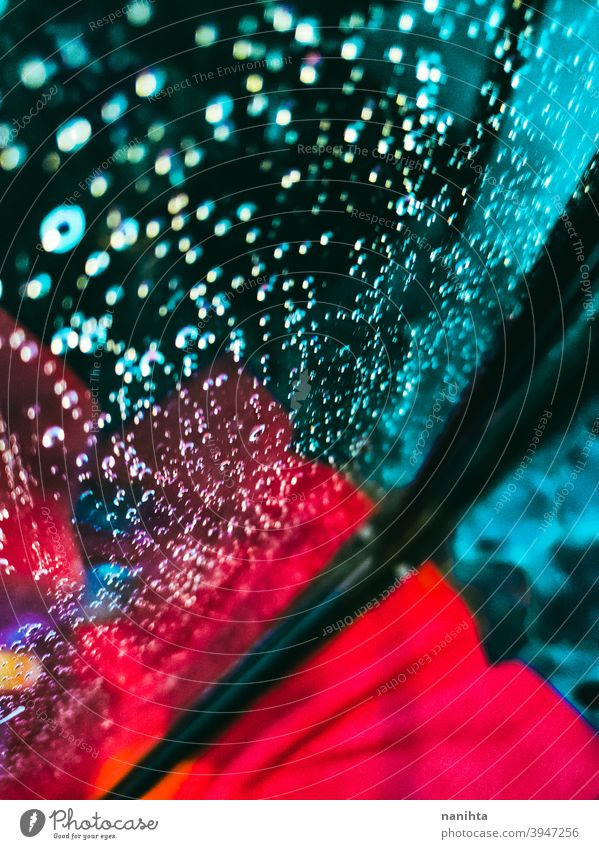 Vibrant background of water drops in a shower abstract texture bokeh depht of field lights contrast vibrant cool clean dark backdrop wallpaper neon night
