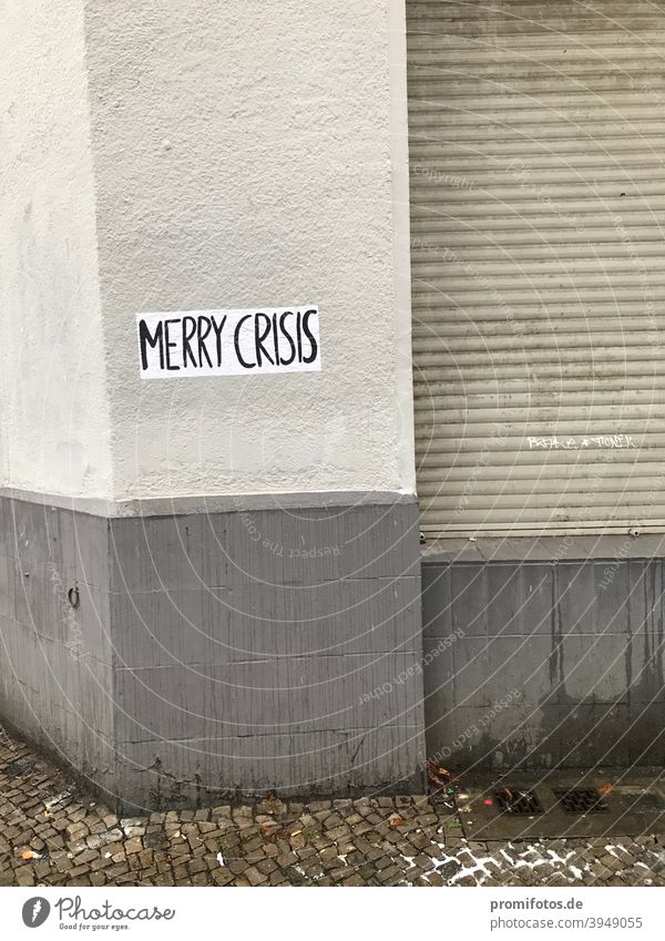 Lettering "Merry Crisis" on a house wall 2. photo: Alexander Hauk writing lettering House (Residential Structure) Wall (building) Exterior shot daylight