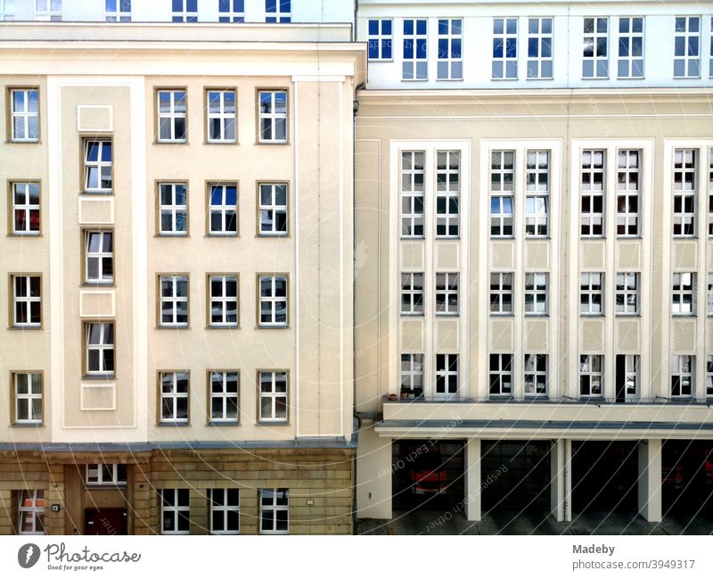 Restored old building with fire station and beautiful facade in natural colors in Voltairestaße in the capital Berlin Old building Facade Fire station Window
