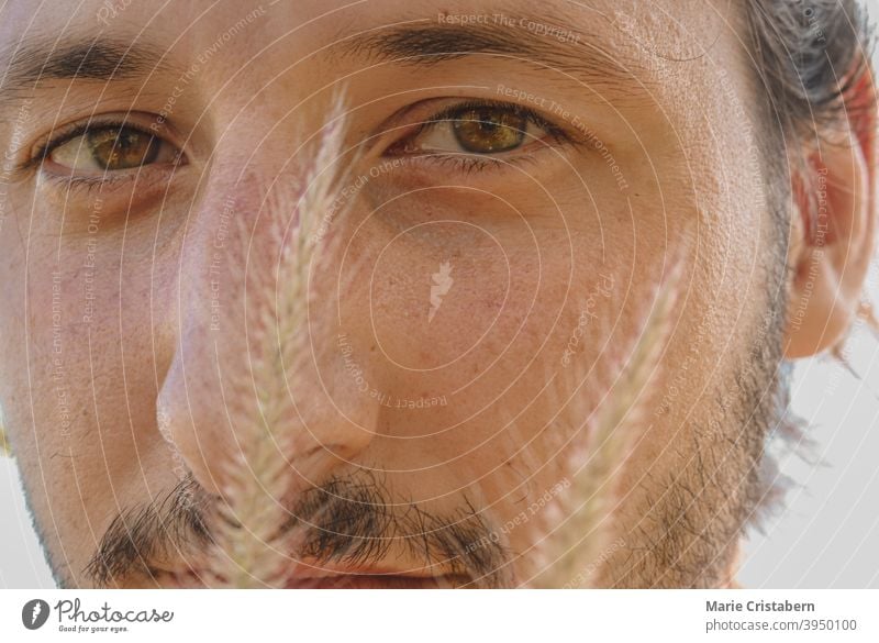 Portrait of an attractive man conceptual portrait freckles springtime bright and airy hazel eyes caucasian ethnicity summer vibes human face close-up one person