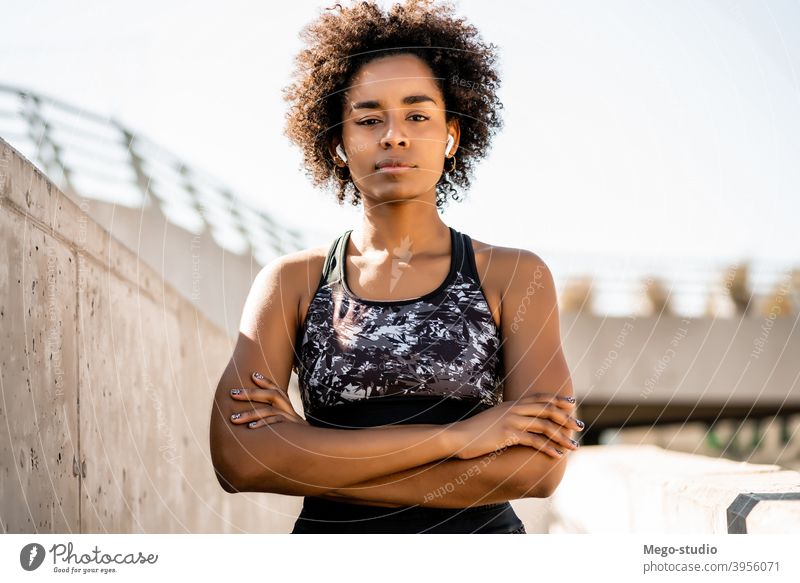 Afro athlete woman standing outdoors. fitness sport exercise resting break relax enjoying relaxation leisure city sporty relaxing sportswoman active health