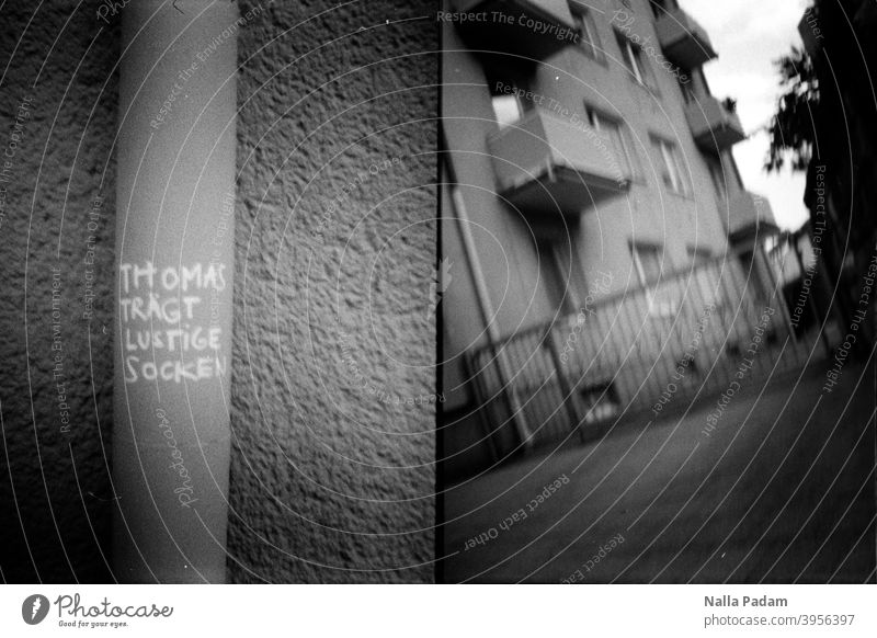 Cityscape Duet 1 Analog Analogue photo black-and-white Downpipe Text graffiti saying Thomas wears funny socks House (Residential Structure) The Ruhr
