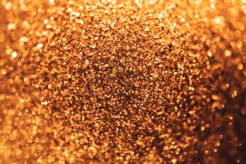 Golden texture sparkling Christmas & Advent visualization Graphic golden background bright glitter luxury