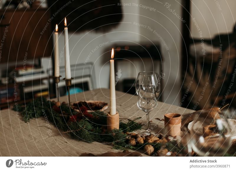 Festive Christmas table with decorations christmas interior cozy rustic natural home xmas candle style decorative garland design atmosphere holiday celebrate