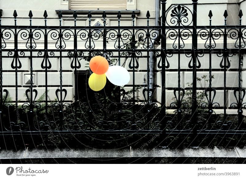 Balloons on the fence Fence Real estate House (Residential Structure) Apartment Building dwell celebration Birthday Party decoration Decoration Jewellery