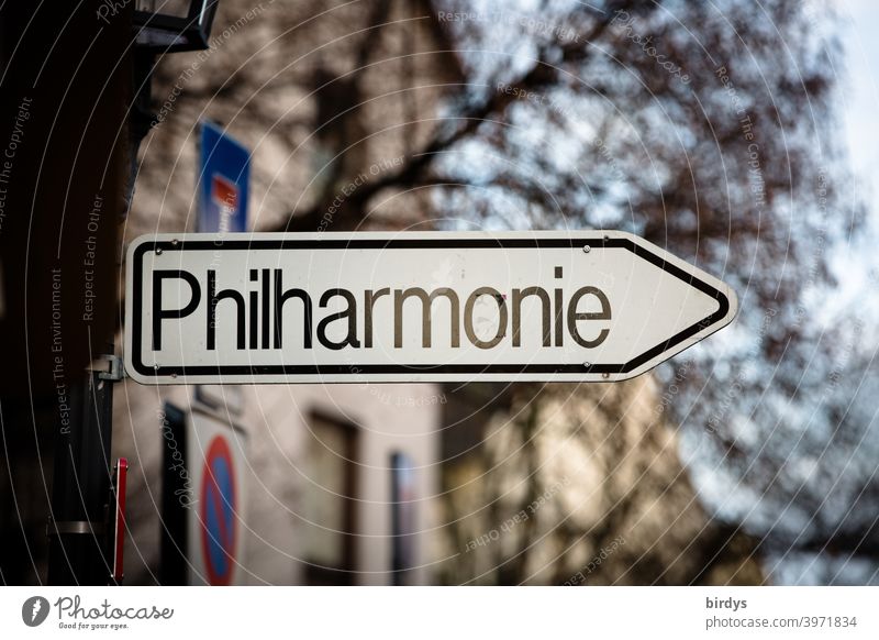 Philharmonie, road sign pointing the way to the Philharmonie. Culture, Music,Cultural philharmonic orchestra Art groundbreaking street sign Arrow Characters