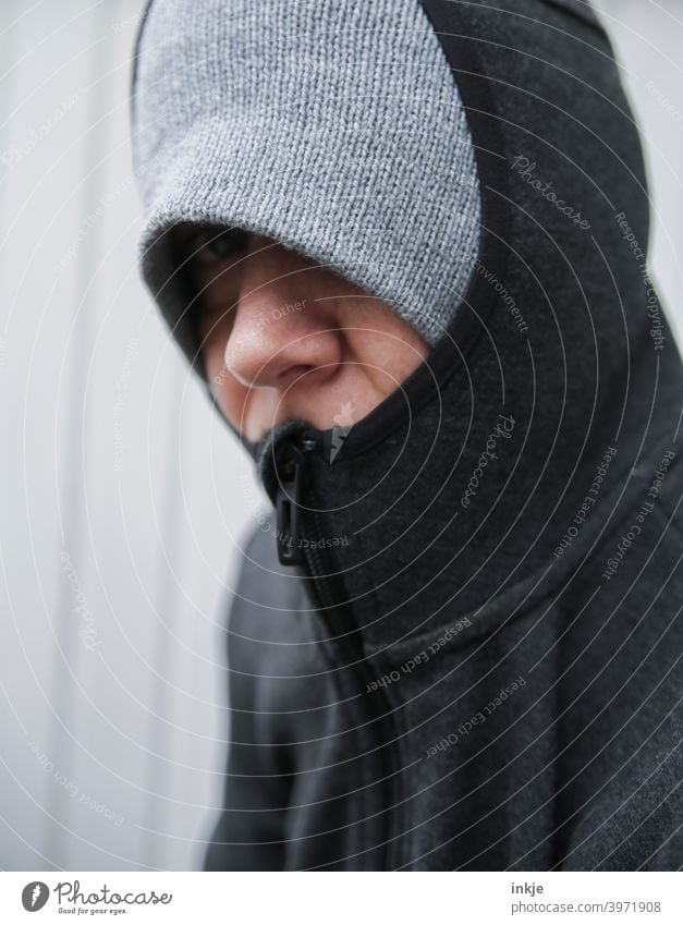 Close up of a freezing hooded woman Colour photo Close-up Exterior shot portrait portrait of a woman Anonymous Masked Authentic tired Boredom lockdown