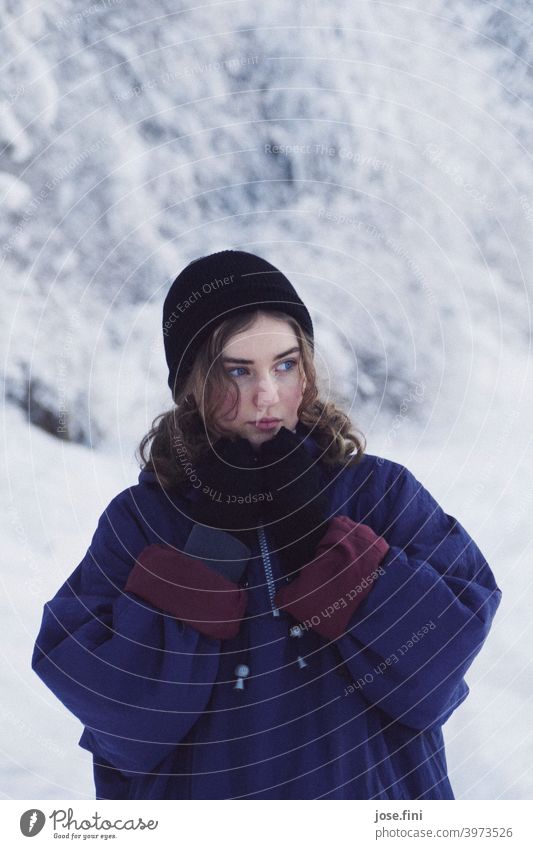 Young woman with warm clothes, snow in the background. one person young adult Girl Youth (Young adults) Feminine portrait pretty Fresh naturally Authentic