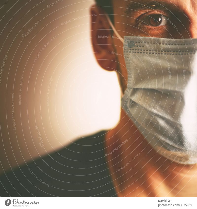 Corona - Man with medical mask / new rules coronavirus Medical Mask Tightening pandemic mutation Respirator mask Classification Protection