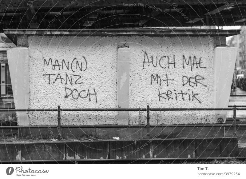 Berlin Pankow ... a graffiti text Graffiti Tagger Text Black & white photo Schönhauser Allee Criticism Dance Exterior shot Old town Town Building Old building