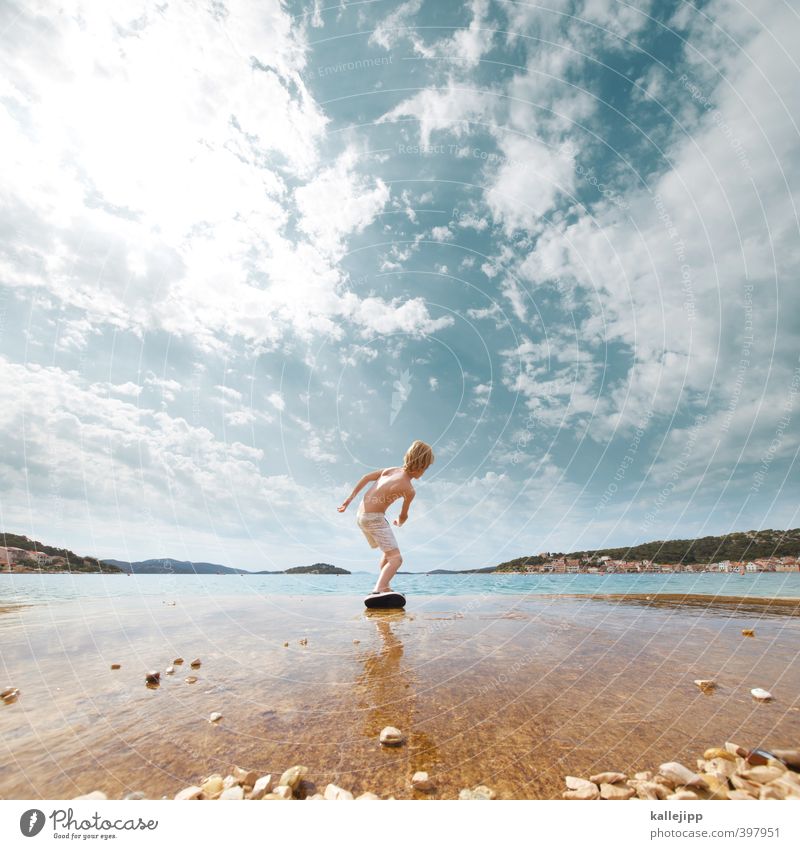 floating stones Leisure and hobbies Playing Human being Child Boy (child) Life Body Skin 1 Environment Nature Landscape Water Sky Clouds Sun Summer Climate