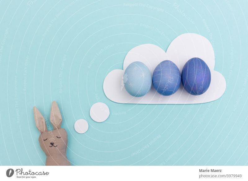 Easter bunny dreams of blue dyed easter eggs rabbit Design Dream daydreaming Easter Bunny Easter egg Easter eggs Egg fun Funny Happy Public Holiday Humor