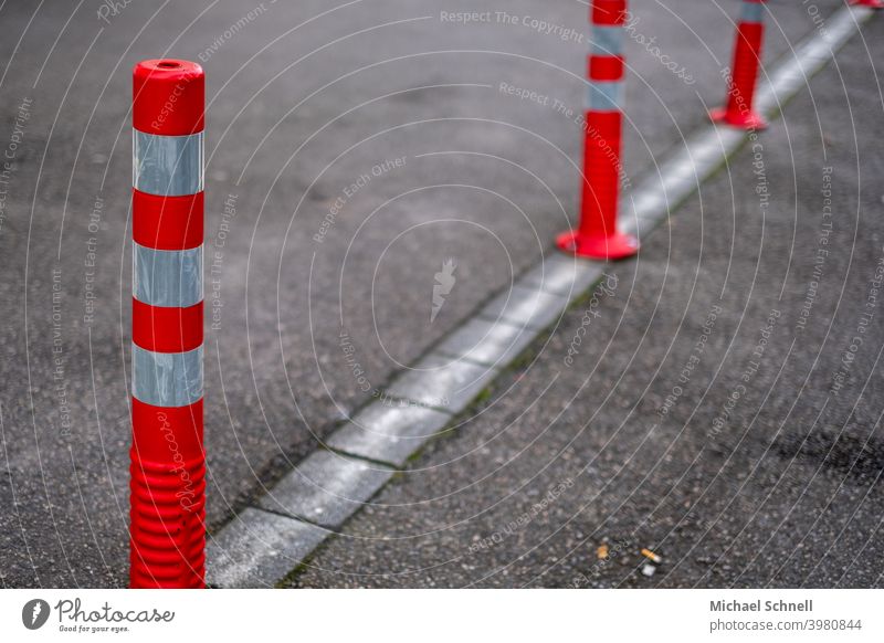 Red and white bollards cordon Bollard Barrier Safety Protection Structures and shapes Bans forbidden