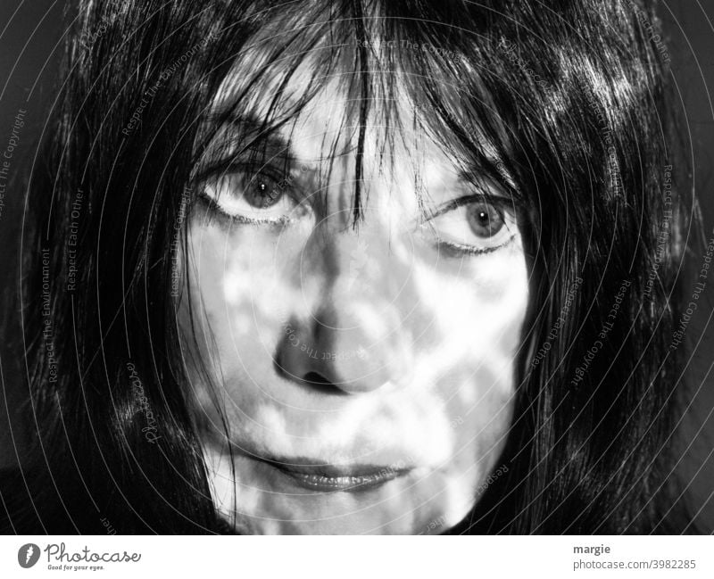 The face of a woman with shadow Face Woman eyes Mouth Head Human being portrait Nose Feminine Young woman Adults Lips Black & white photo Face of a woman