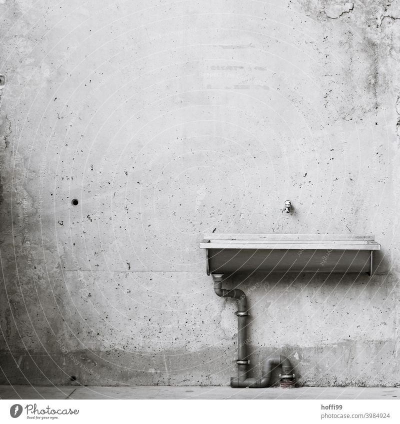 Washbasin on exposed concrete Tap Drainpipe Sink Drainage Concrete wall Minimalistic exposed concrete wall minimalism Architecture Wall (barrier) Modern Line
