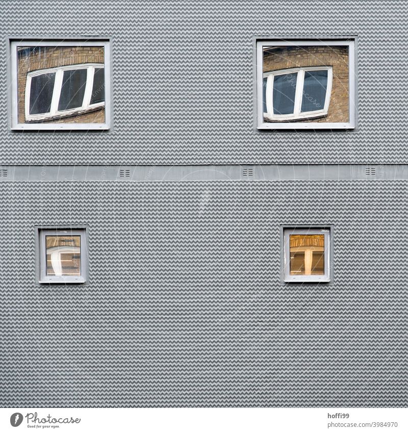grey facade with windows reflecting in windows Architecture Facade Window Exotic Poverty Mysterious Irritation Symmetry Subdued colour Exceptional Gloomy Modern