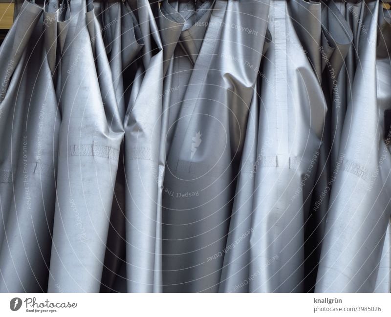 Glossy grey curtain Drape Screening Folds Cloth Decoration Structures and shapes Wrinkles Light and shadow Glittering metallic Hang Deserted Detail ruffled